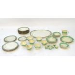 A quantity of Booths china dinner wares to include plates, serving dishes, etc with green banded