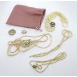 An assortment of costume jewellery, to include pearl necklaces, etc. Please Note - we do not make