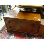 A 19thC and later mahogany low cabinet with two drawers Please Note - we do not make reference to