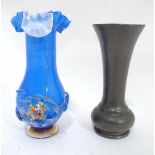 An Arts and Crafts Tudric pewter vase together with an Art glass vase (2) Please Note - we do not