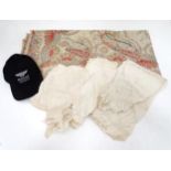 A quantity of assorted lace, fabric etc. Together with a Bentley cap