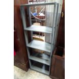 A grey painted bookshelf Please Note - we do not make reference to the condition of lots within