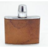 A leather cased hip flask 4oz Please Note - we do not make reference to the condition of lots within