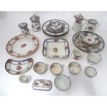 A quantity of Booths silicone china dinner wares decorated with fruit retailed by T. Goode & Sons,