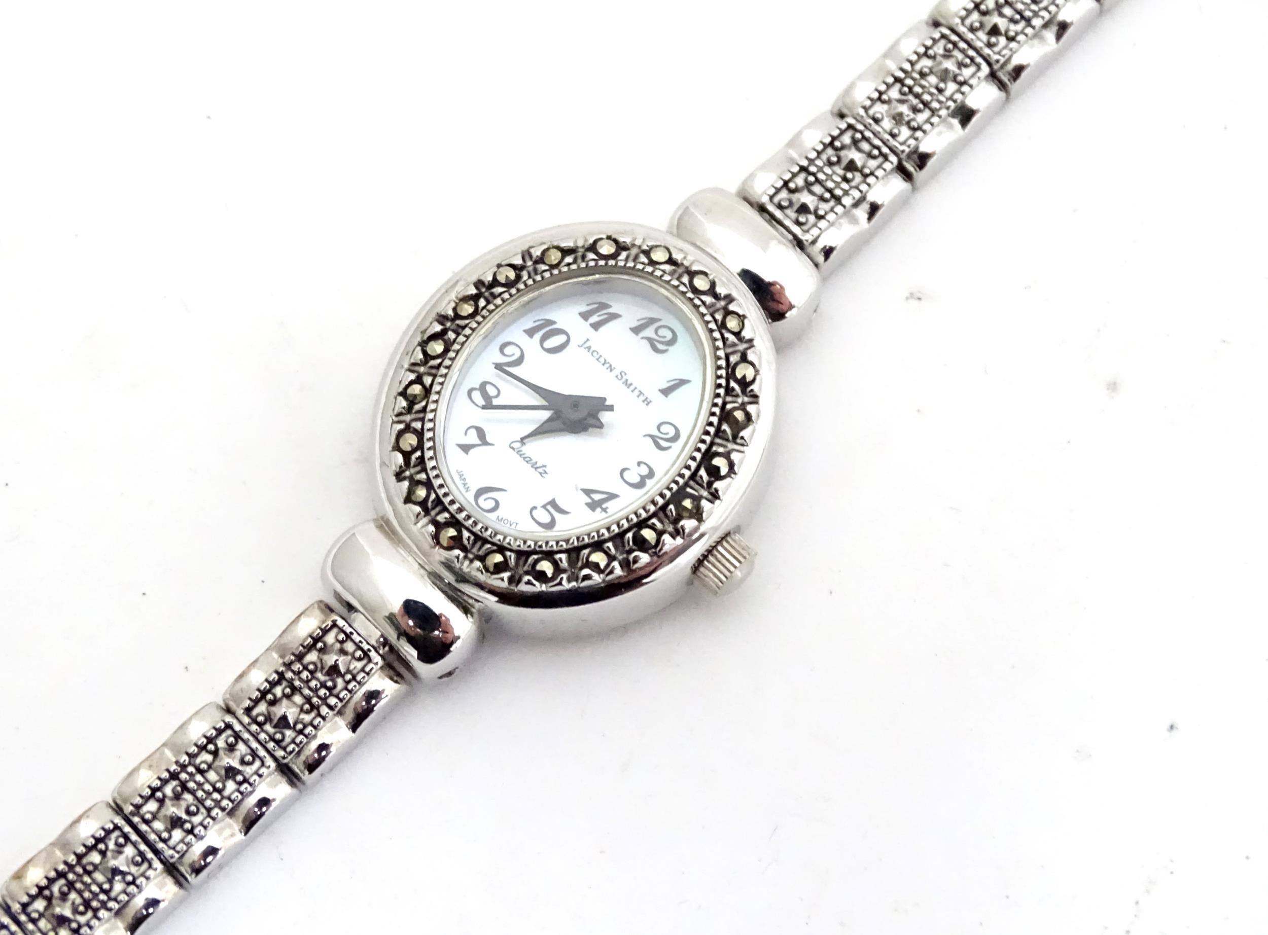 A ladies wrist watch with marcasite detail Please Note - we do not make reference to the condition