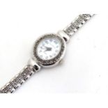 A ladies wrist watch with marcasite detail Please Note - we do not make reference to the condition