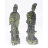 Two Oriental carved figures Please Note - we do not make reference to the condition of lots within