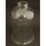A clear glass shade of bell form approx. 10" long Please Note - we do not make reference to the