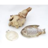 Three assorted items comprising a carved shell formed as a fish, a carved shell with Last Supper