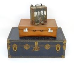A canvas and leather trunk with brass reinforcements. Please Note - we do not make reference to