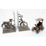 Bicycle bookends together with a scratch built model of an old car. Please Note - we do not make