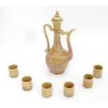 An Oriental coffee set comprising hot water pot and coffee cups / cans. Character marks under.
