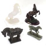 Four horse ornaments. Largest approx. 11" high Please Note - we do not make reference to the