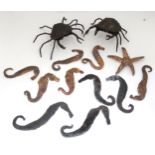 An assortment of metal sea life ornaments, to include seahorses crabs etc. Please Note - we do not