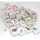A large quantity of themed playing cards, to include Cats of the World, Classic Roses, Wild Animals,