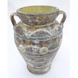 A large stoneware urn / vase. Approx. 17 1/2" high Please Note - we do not make reference to the