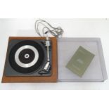 A Garrard record player Please Note - we do not make reference to the condition of lots within