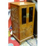 Oriental carved hardwood cabinet Please Note - we do not make reference to the condition of lots