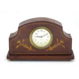 A German mantle clock with inlaid case, movement marked Mercedes. Approx. 7 1/2" wide Please