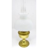 An Aladdin no. 3 oil lamp with a milk glass shade Please Note - we do not make reference to the