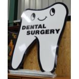 Dentist sign formed as a large metal tooth advertising 'dental surgery' Please Note - we do not make