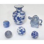 A quantity of assorted Oriental blue and white ceramics to include a vase, teapot, carpet bowls etc.