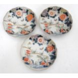 Three Oriental plates