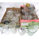 A large quantity of assorted glassware to include vases, jugs, jars and stoppers, dishes, etc Please