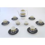 A quantity of retro Susie Cooper coffee wares in the pattern Diablo, designed for Wedgwood.