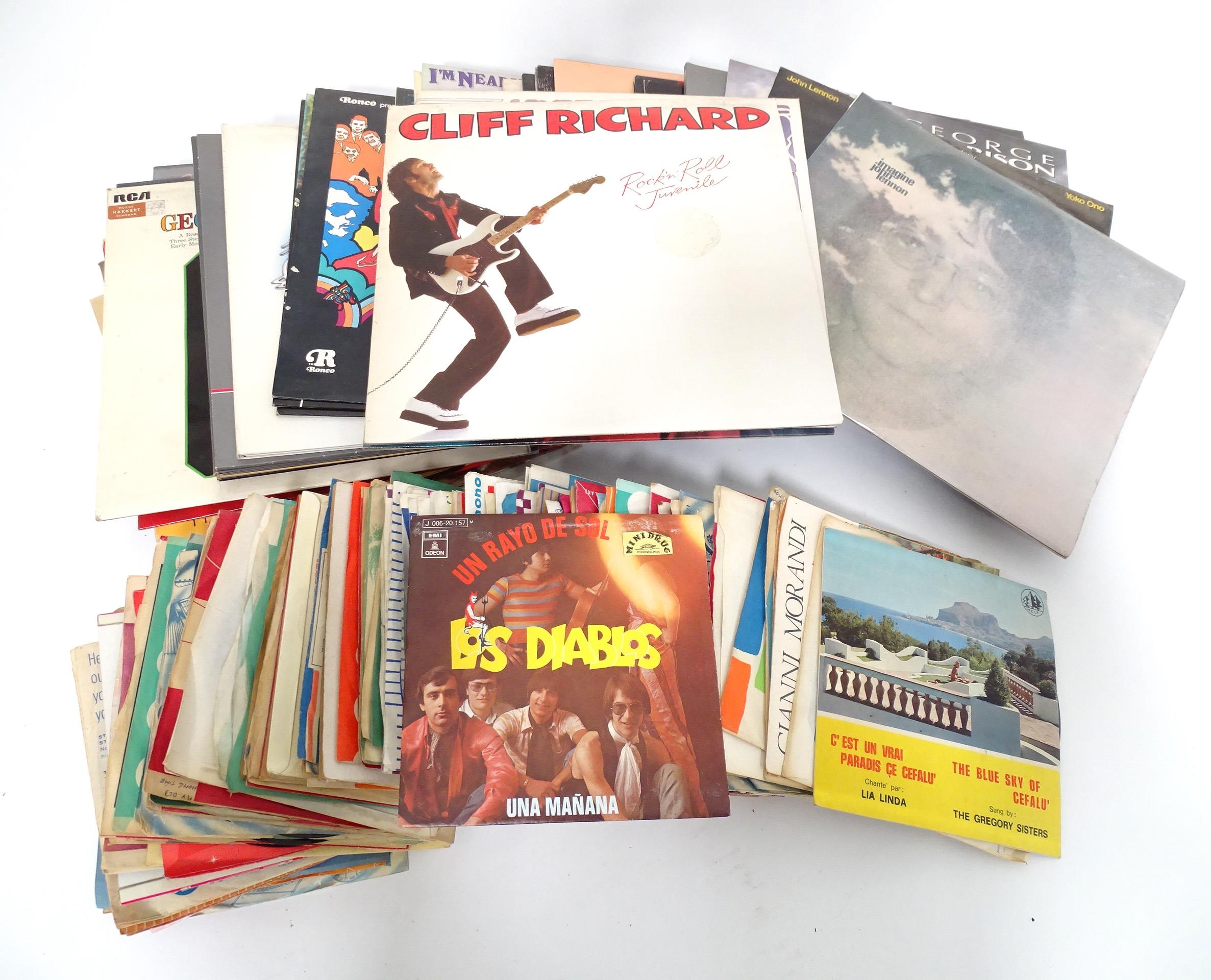 Collection of vinyl records to include John Lennon, Paul McCartney, ELO etc Please Note - we do