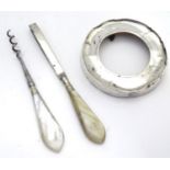 A small silver pot lid, together with 2 mother of pearl handled manicure utensils (3) Please