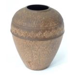 A cast vase of urn form with banded geometric detail Please Note - we do not make reference to the