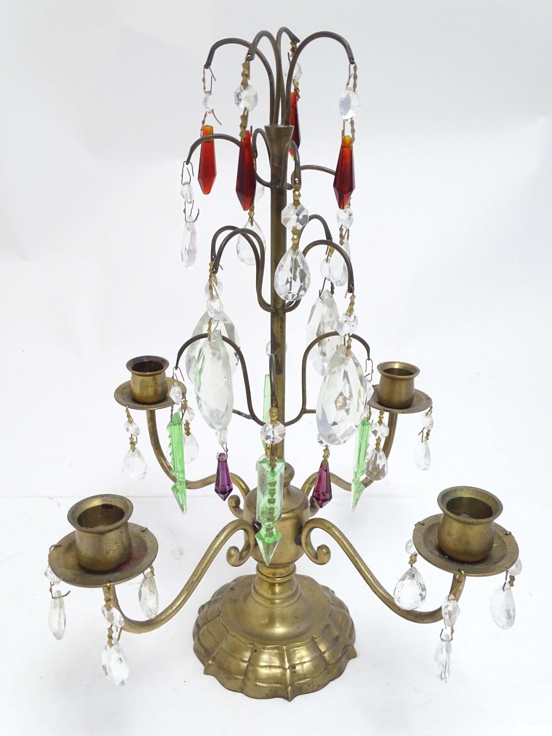 A 20thC brass candelabra / candelabrum with four branches and cups, decorated with red, green,