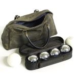 A cased set of four Parlane boules and two associated jacks, one by Slazenger Please Note - we do