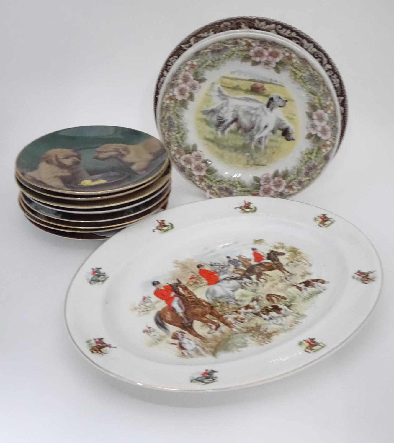 A quantity of plates to include a meat plate with hunting scenes, Hamilton Collection