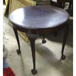 Mahogany circular occasional table with ball and claw feet. Approx 26 1/2" diameter Please Note - we