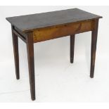 A stained pine occasional table Please Note - we do not make reference to the condition of lots