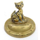 20thC brass ash tray formed as a cat Please Note - we do not make reference to the condition of lots