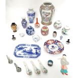 A quantity of assorted Oriental ceramics to include vases, spoons, plates, dishes, etc. Please