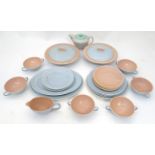 A quantity of Poole Pottery dinner wares to include plates, soup bowls, teapot etc. Please Note - we