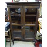 Early 20thC mahogany bookcase. Approx. 64 1/2" high Please Note - we do not make reference to the