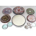 A quantity of assorted ceramics to include chargers, large wash bowl, Oriental bowls, vase, etc.