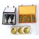 A pair of boxed Oriental carved cups, with 3 boxed lacquered bowls and 4 hand painted bottle