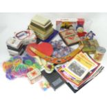 A quantity of assorted miscellaneous to include books, games, boomerang, various issues of JJ