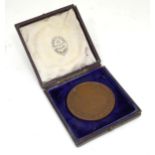 A cased cast rowing medal for Magdalen College Boat Club, Oxford Please Note - we do not make