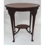 Edwardian 2-tier occasional table. Approx 29" high Please Note - we do not make reference to the