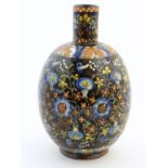 A Thoune style vase with a bulbous body decorated with scrolling floral and foliate detail.