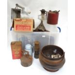 A quantity of early to mid 20thC tins, cans, bottles, etc. to include a Castrol motor oil glass