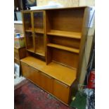 A late 20thC teak Meredew cabinet with glazed section Please Note - we do not make reference to