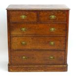 A late 19thC Victorian pine chest of drawers with a moulded top above two short over three long